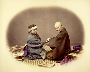 Japanischer Arzt und sein Patient, ca. 1890